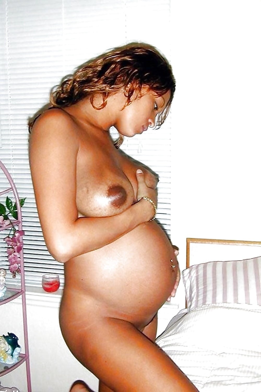 Беременные голые негры женщины.