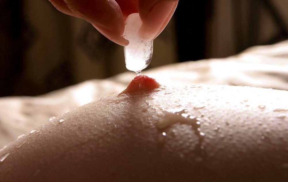 Girl with Ice Cubes on nipples