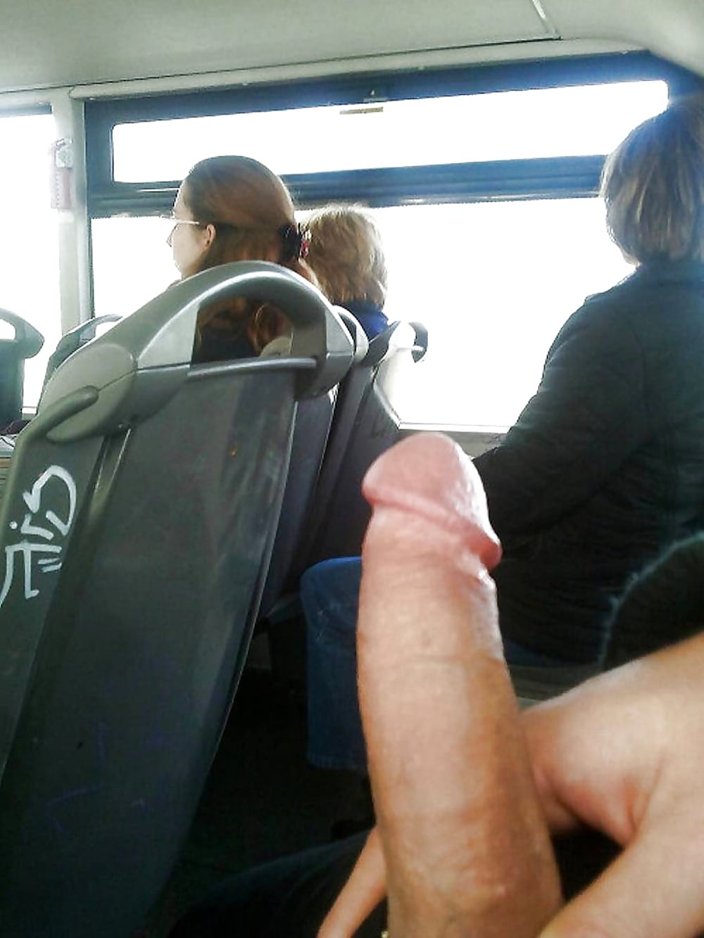 Man in the public transport flashing his naked cock