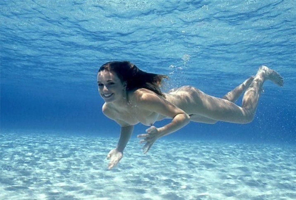 Nude women underwater